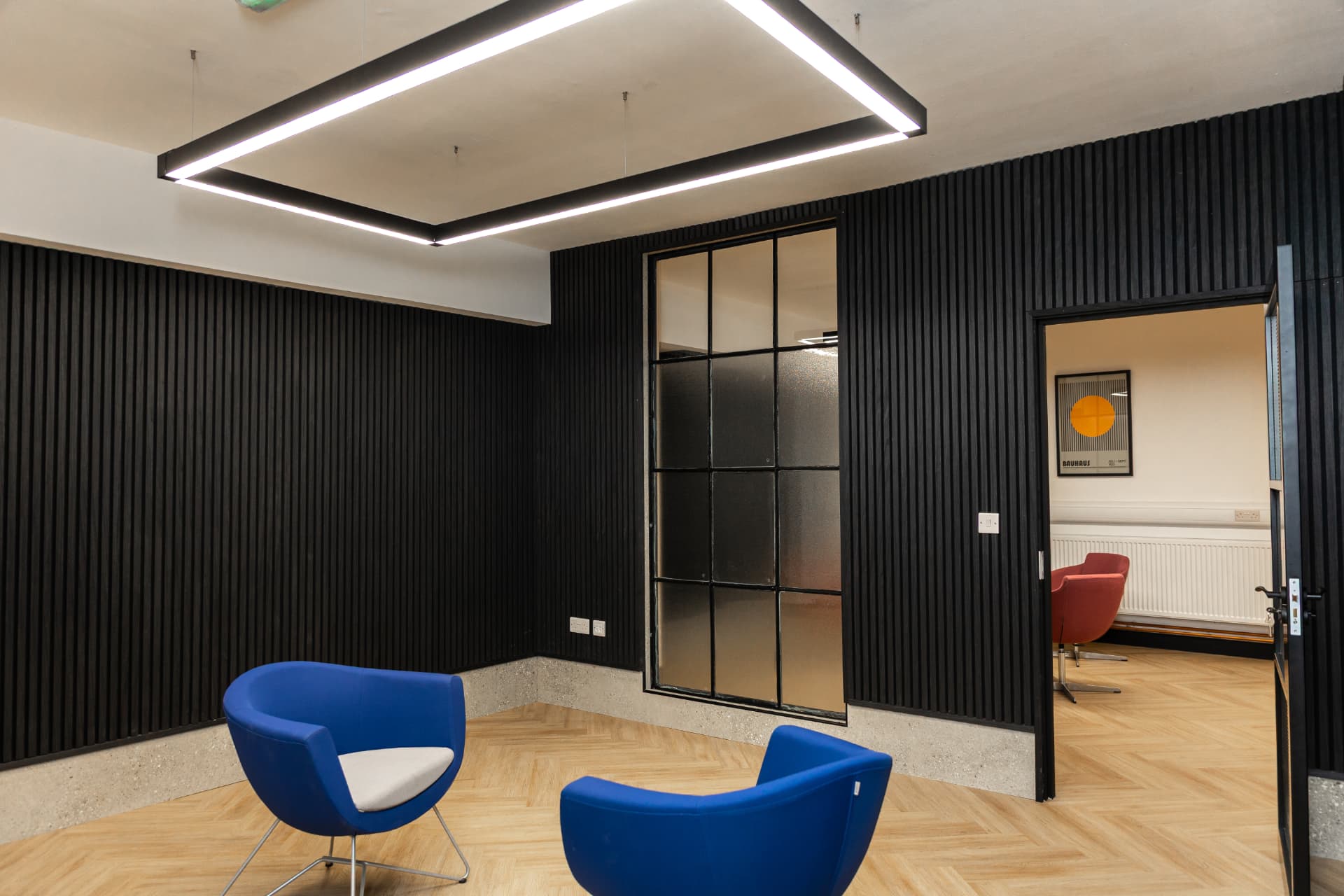 Medium room at Patrick's with modern furniture and an open doorway